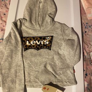 New Levi’s pullover size S in grey & multi colors.